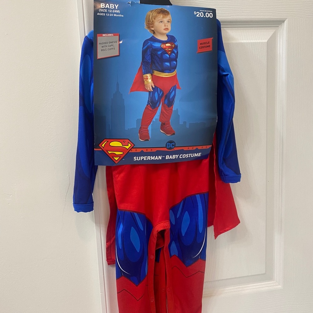 Muscle Superman costume that includes the cape and cuffs. Size 12 - 24 months.